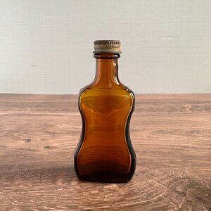 Vintage Crown Colony Guitar-Shaped Amber Glass Bottle With Brass Lid 4 1/2" Tall